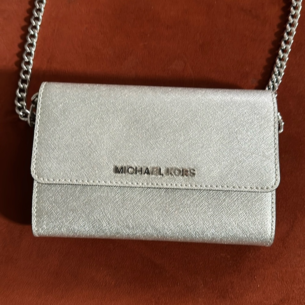 Silver Michael Kors mini crossbody